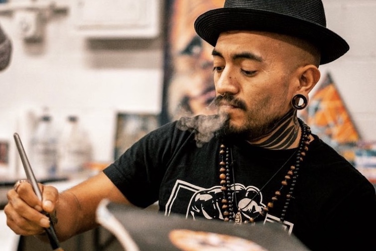 Carlos Roa, who goes by “Roa,'' is a local artist and owner of Fifth Element Tattoo Gallery. He’s featured in this month's Latine and Hispanic arts exhibition at Wild Goose Creative.